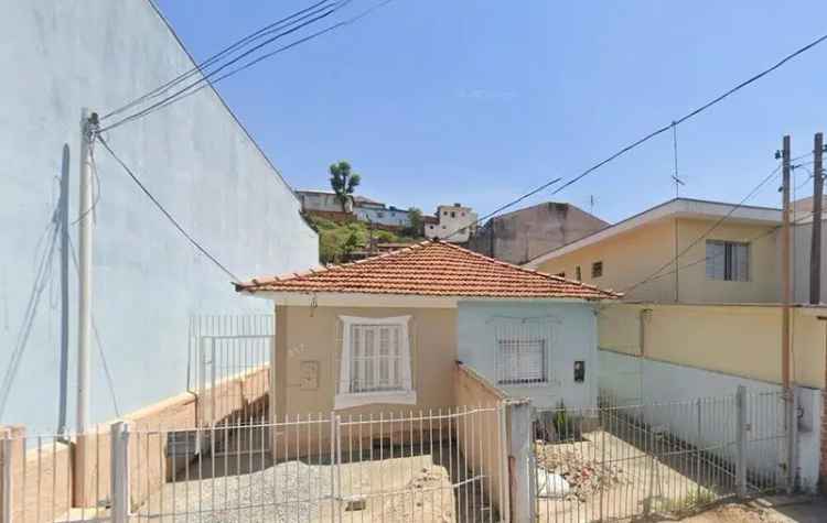 Terreno com 3 Casas - Oportunidade de Investimento em Vila Palmeiras